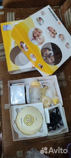 Молокоотсос medela электрический