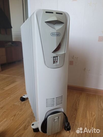 Масляный обогреватель delonghi
