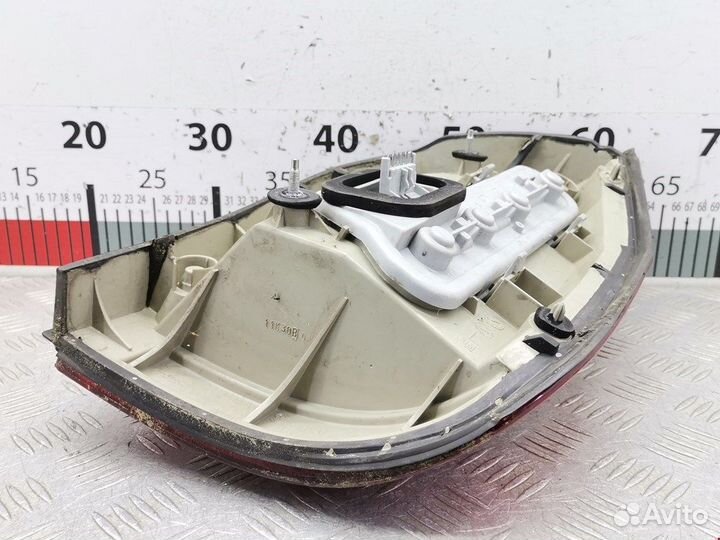 Фонарь задний левый для Opel Zafira A 93175677