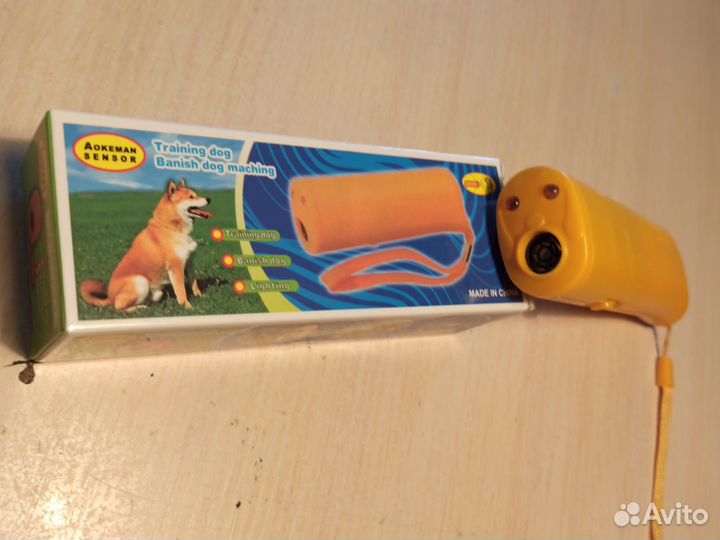 Фонарик и отпугиватель собак