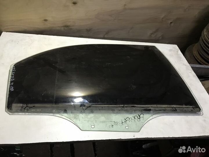 Стекло заднее правое Kia Spectra