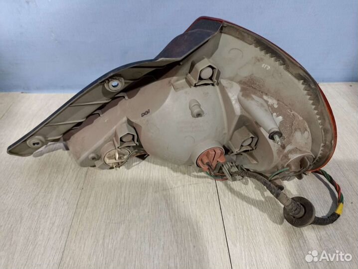 Фонарь левый Kia Spectra (Спектра)