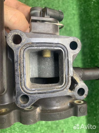 Корпус термостата Opel Astra H (2004-2014)