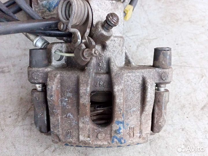 Суппорт задний Mazda 3 BK BL