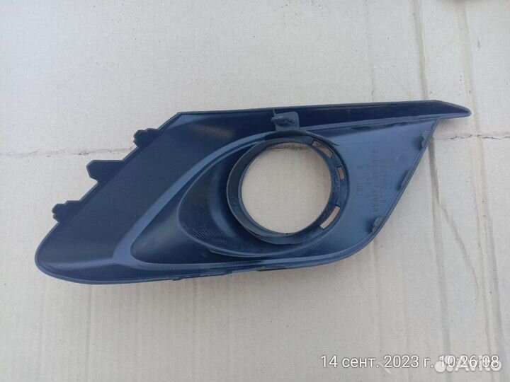 Рамка фары противотуманной левой Mazda 3