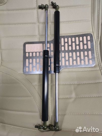 Амортизаторы на капот Land Cruiser 100