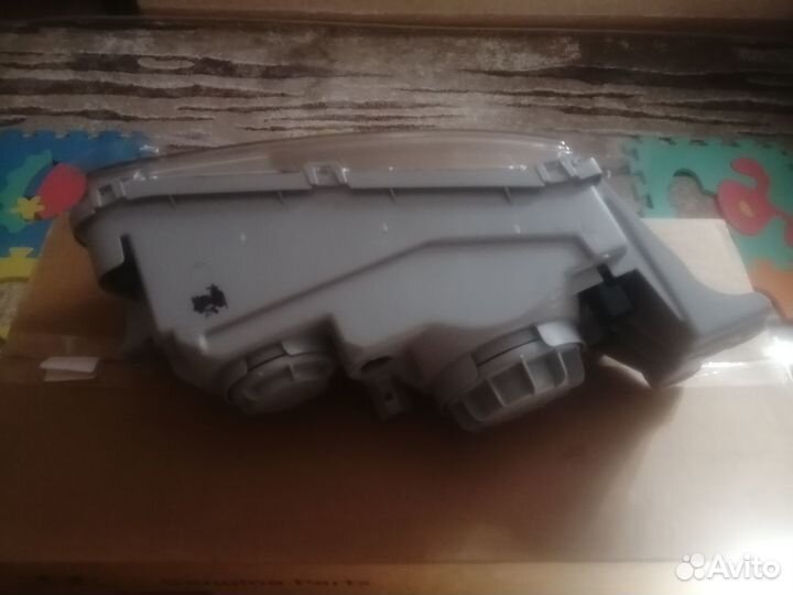 Новая оригинальная фара левая Hyundai Starex H1