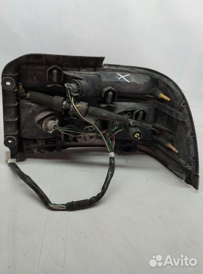 Фонарь левый Toyota Corolla 100