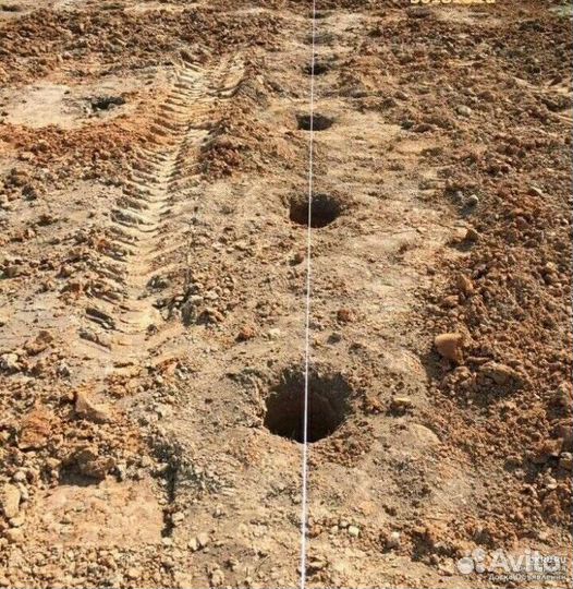 Бурения лунок под столбы