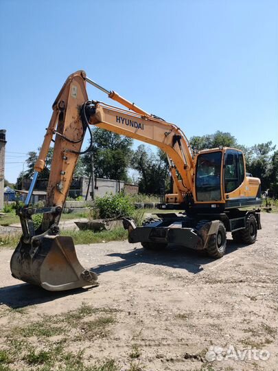 Колёсный экскаватор Hyundai R180W-9S, 2014