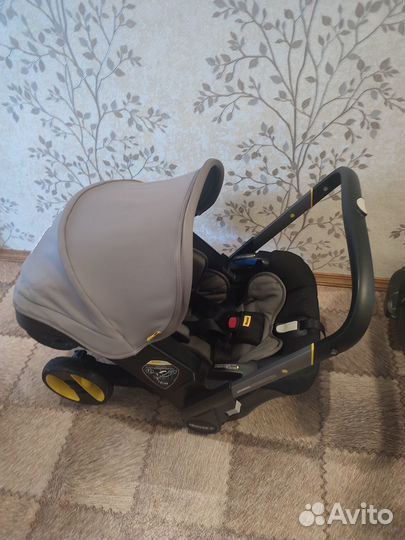 Коляска автокресло doona с базой isofix