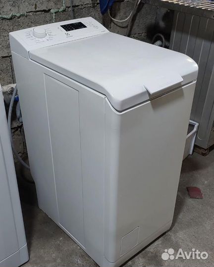 Стиральная машина с вертикальной загрузкой