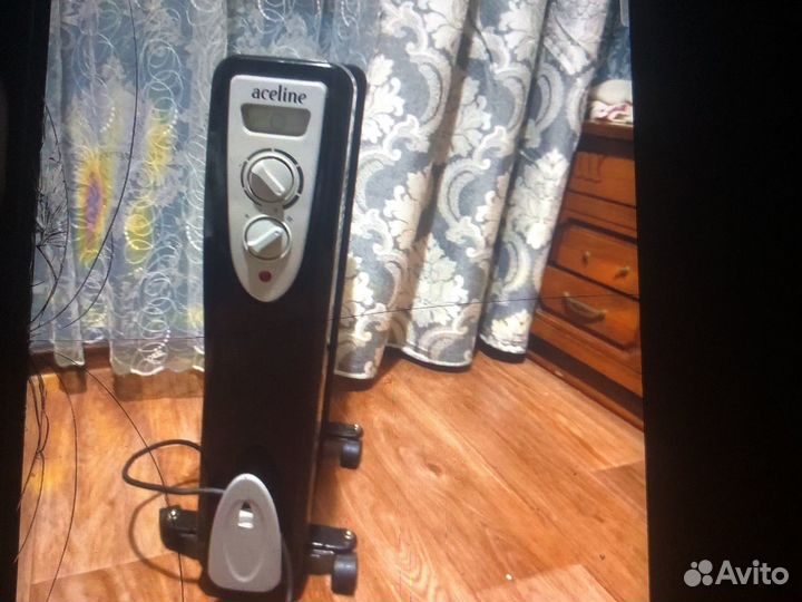 Масляный обогреватель