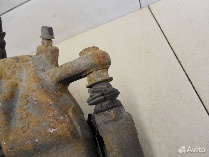 Суппорт передний левый Almera (G15) 2013