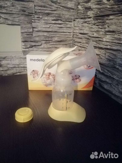 Молокоотсос medela ручной