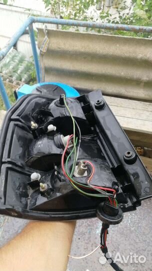 Фонарь задний мазда 323