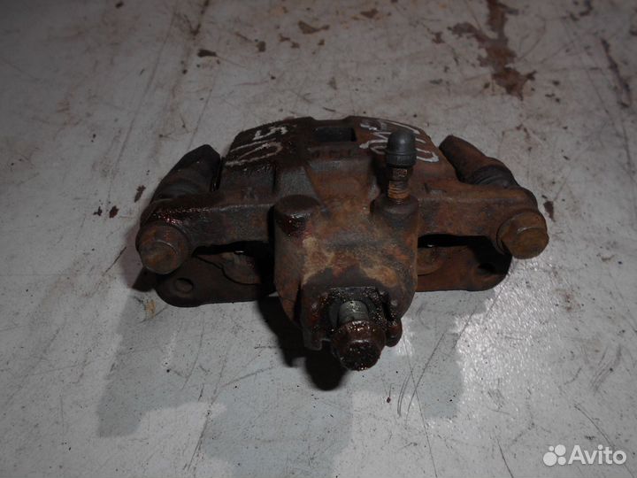 Суппорт задний тормозной Subaru Forester S10