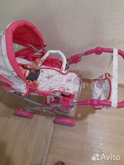 Детская игрушечная коляска