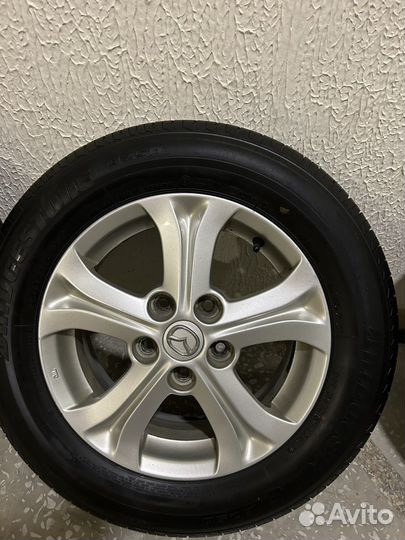 Колеса оригинал Mazda r15 летние