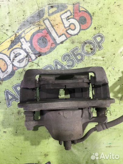 Суппорт тормозной передний левый Hyundai Solaris 1