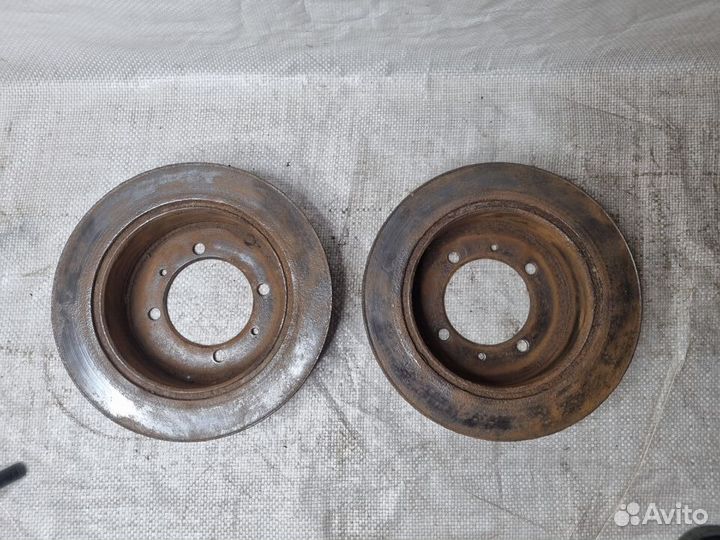 Диски тормозные задние Мицубиси Лнсер 9