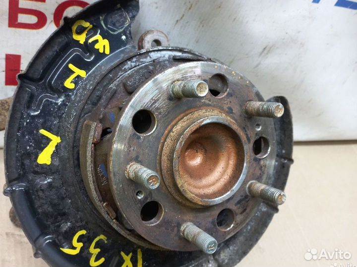 Кулак задний левый Kia Sportage 3 SL 2wd