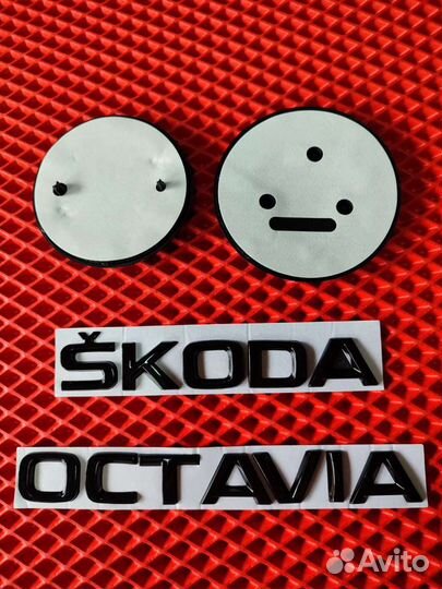 Эмблема на Skoda octavia цена за 4шт