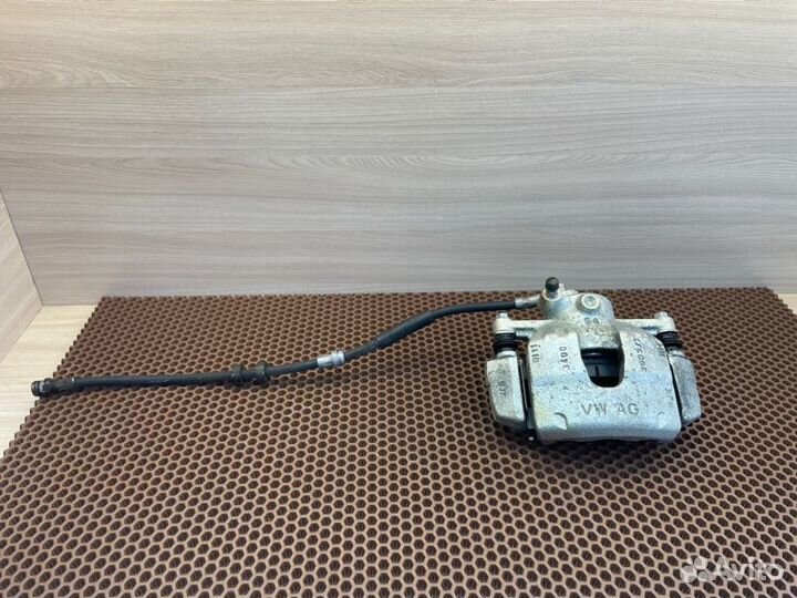 Суппорт тормозной передний правый Skoda Rapid