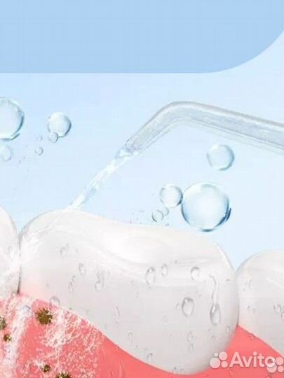 Ирригатор портативный новый+подарок 2 шт з/щ