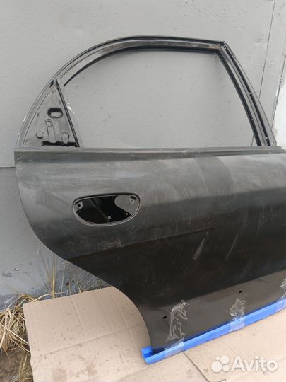 Дверь задняя правая Daewoo Nubira J150