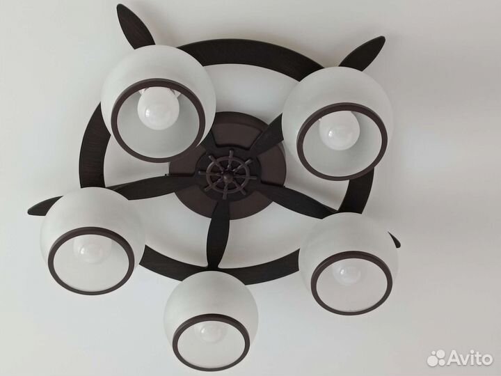 Люстра штурвал в морском стиле