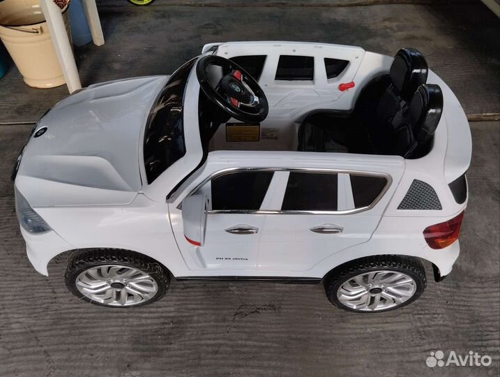 Детская машинка каталка электро