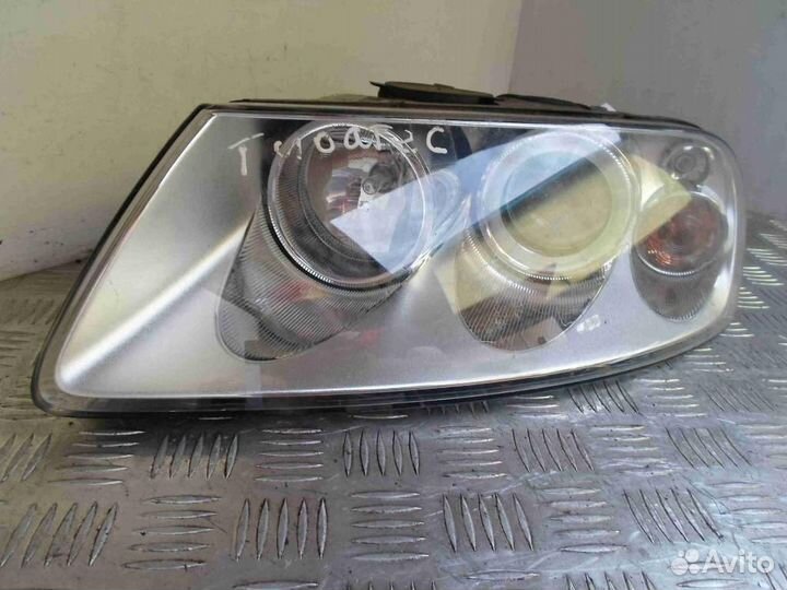 Фара левая Volkswagen Touareg