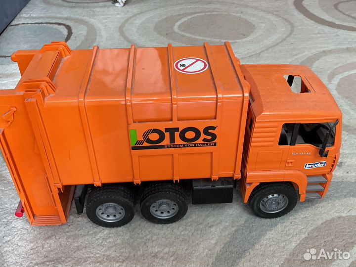 Детская игрушка Bruder мусоровоз