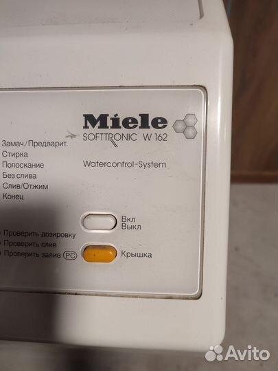 Стиральная машина с вертикальной загрузкой Miele