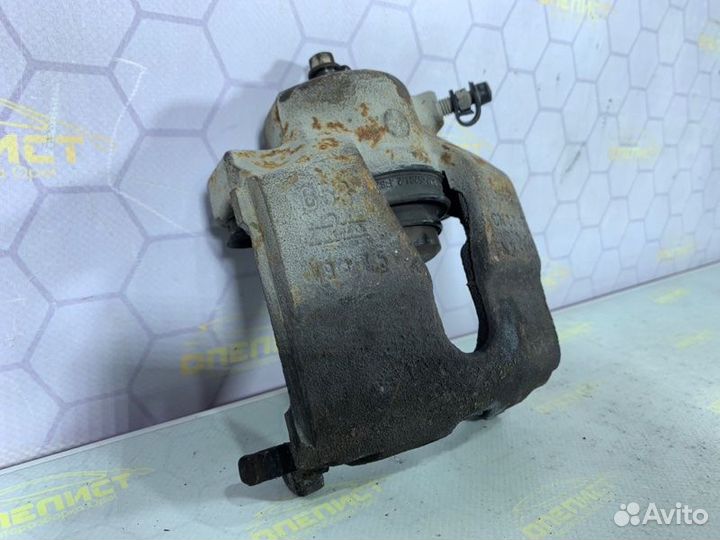 Суппорт тормозной передний левый Opel Astra G