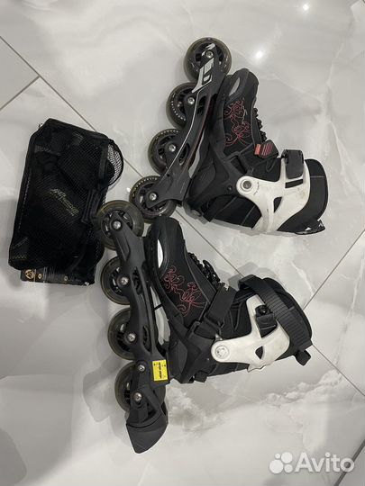 Роликовые коньки