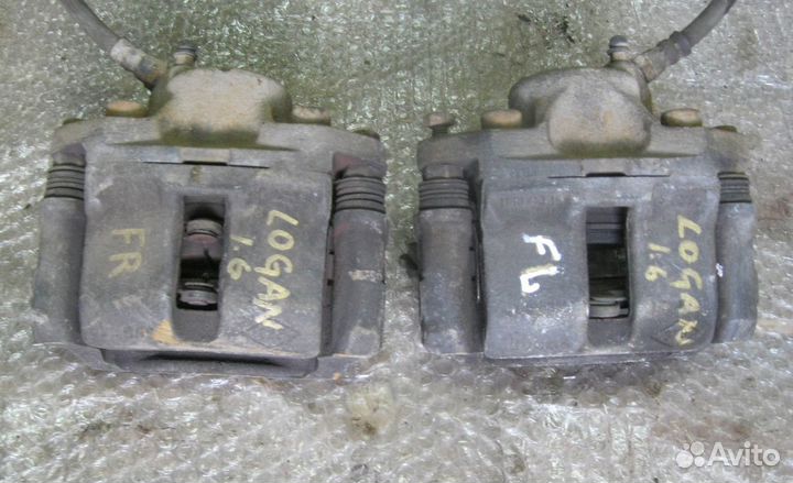 Суппорт передний левый Renault Logan 1.6