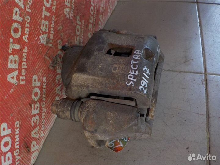 Суппорт тормозной передний левый Kia Spectra