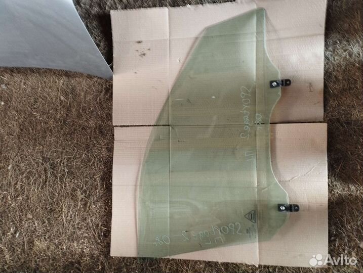 Стекло передней левой двери Kia Sportage 2
