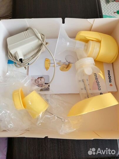 Молокоотсос medela электрический