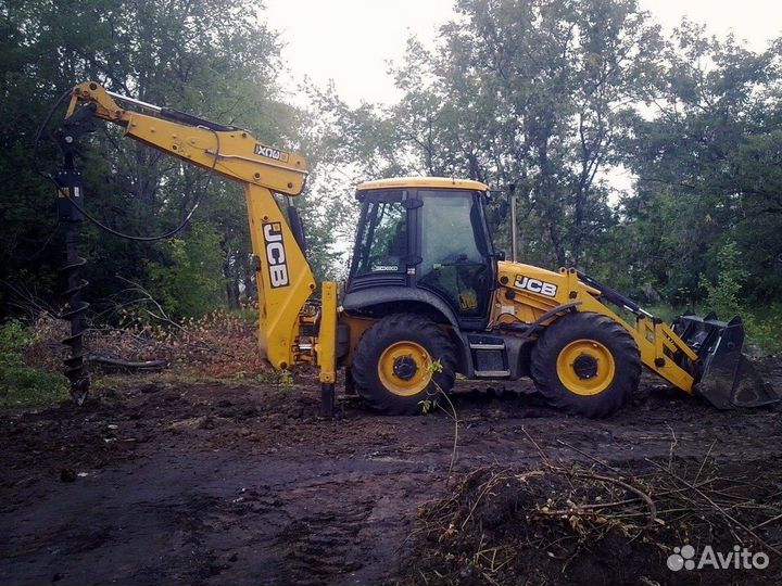 Услуги экскаватора погрузчика с ямобуром и молотом