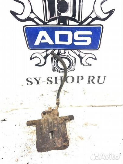 Суппорт тормозной задний левый Ssangyong Rodius