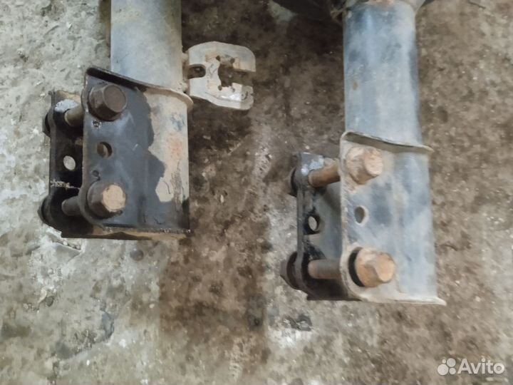 Стойки передние Мазда 626 GD