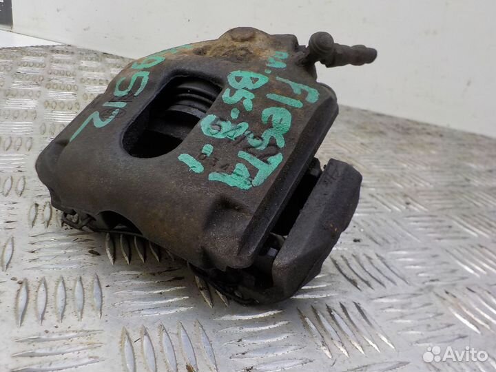 Суппорт тормозной передний левый Ford Fiesta 2001