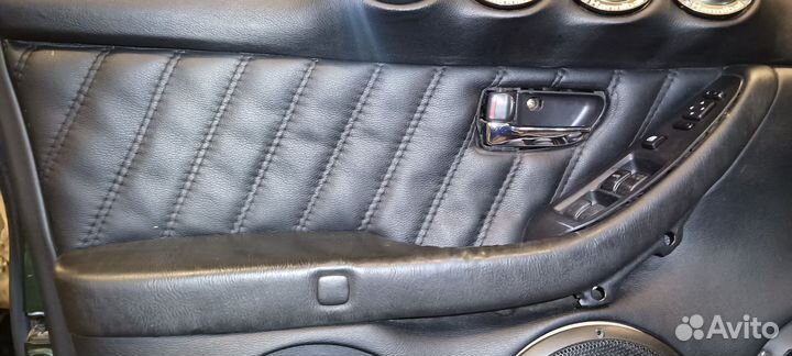 Обшивки дверей субару Легаси