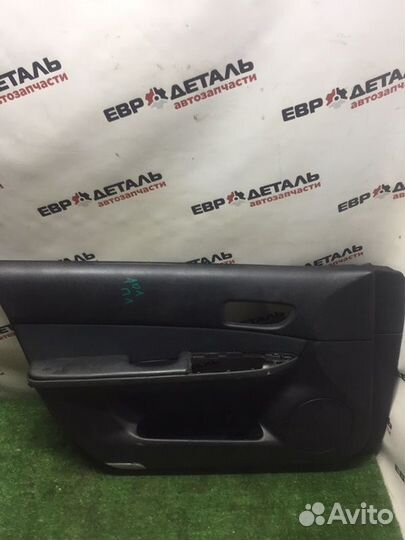 Обшивка боковой двери передняя левая Mazda 6 седан