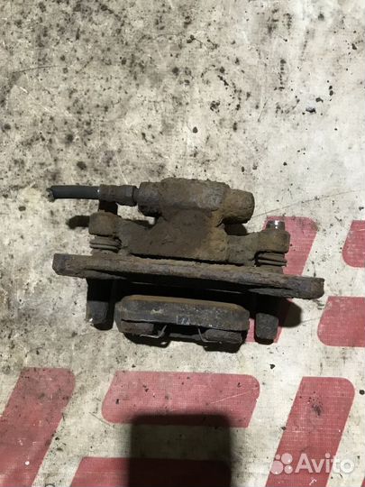 Суппорт тормозной задний Mitsubishi Outlander II р