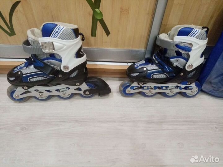 Роликовые коньки