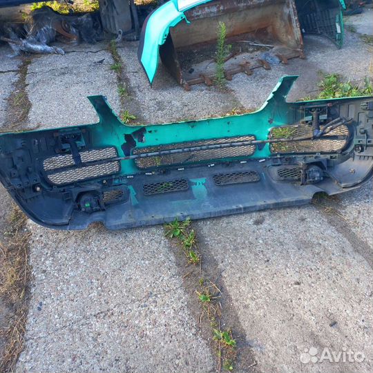 Передний бампер Фольксваген Таурег